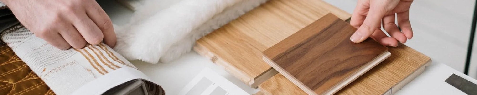 Design Consultation comparing wood flooring samples